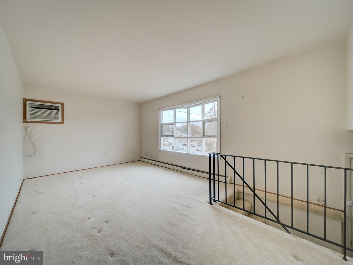 15140 Georgia Road Woodbridge, VA 22191 - Photo 9 of 37 a view of an empty room with a window