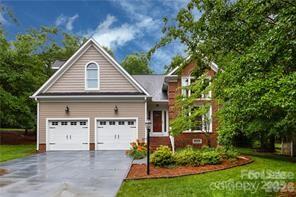 a view of house with garden