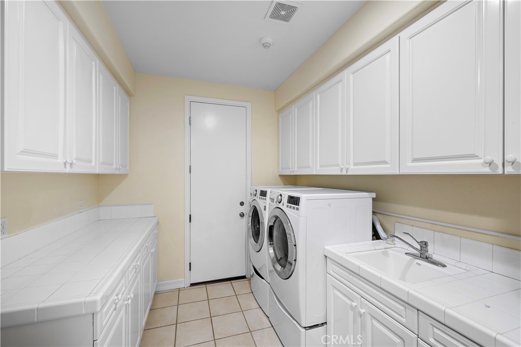 18 Asilomar Road Laguna Niguel, CA 92677 - Photo 39 of 46 Spacious Laundry Room