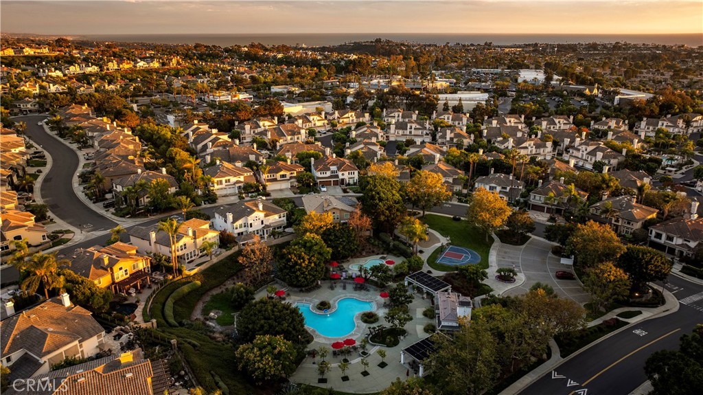 18 Asilomar Road Laguna Niguel, CA 92677 - Photo 40 of 46 Ocean Ranch Community Pool Area with Pacific Ocean in the distance