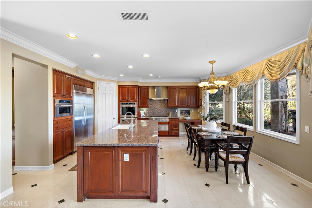 18 Asilomar Road Laguna Niguel, CA 92677 - Photo 10 of 46 Spacious Kitchen with Island and Breakfast Nook
