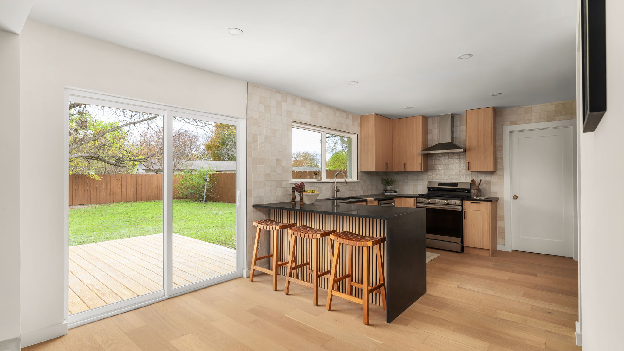 3101 Val Drive Austin, TX 78723 - Photo 18 of 40 a kitchen with a sink stove top oven and cabinets