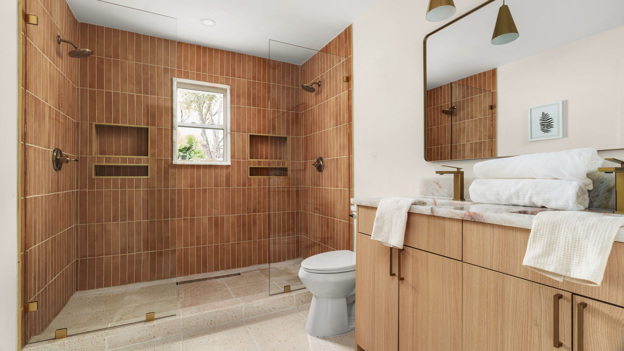 3101 Val Drive Austin, TX 78723 - Photo 3 of 40 a bathroom with a shower a toilet and sink