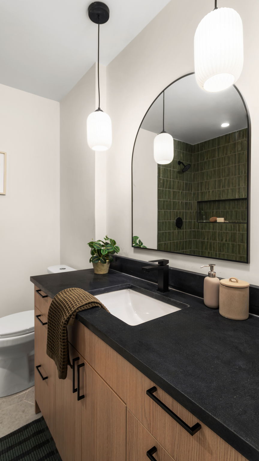 3101 Val Drive Austin, TX 78723 - Photo 35 of 40 a bathroom with a double vanity sink and a mirror