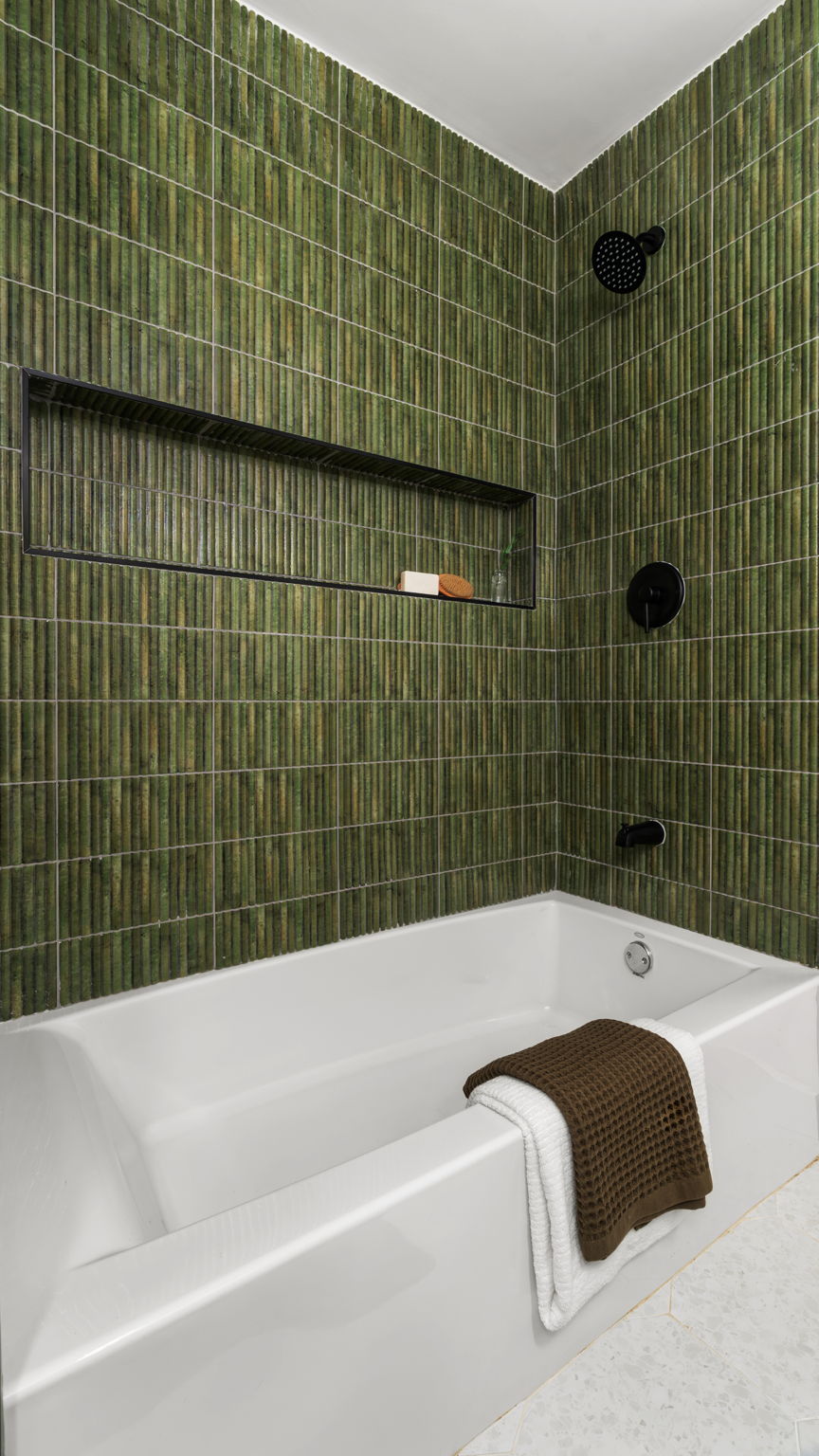 3101 Val Drive Austin, TX 78723 - Photo 36 of 40 a bathroom with a bathtub and a shower