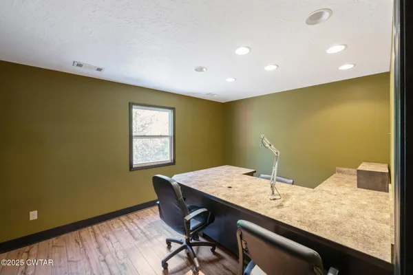 a view of kitchen with wooden floor