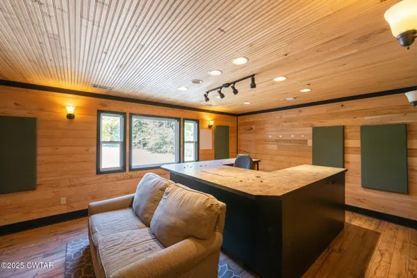 a living room with a couch and a table