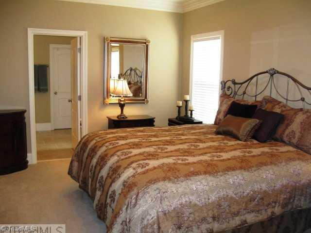5703 Mabe Drive Oak Ridge, NC 27310 - Photo 5 of 15 Master Bedroom.