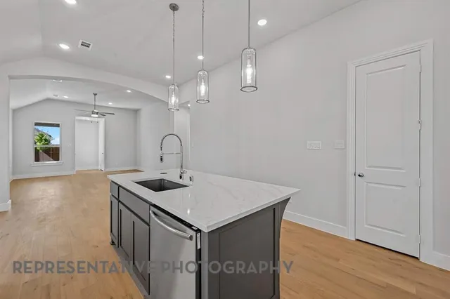 a view of a bathroom sink and a mirror