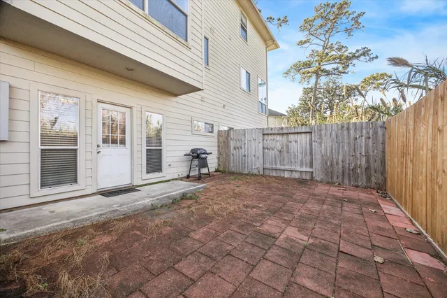 a view of a backyard of the house