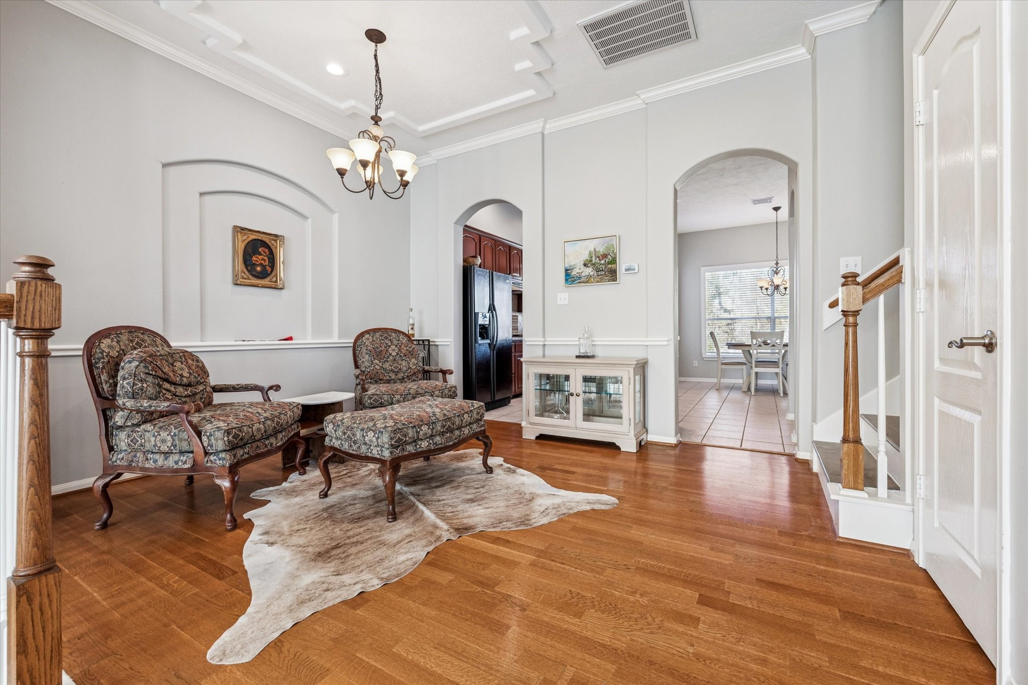 1802 Stacy Falls Houston, TX 77008 - Photo 5 of 21 Formal dining room offers hardwood floors, moldings and access to kitchen.