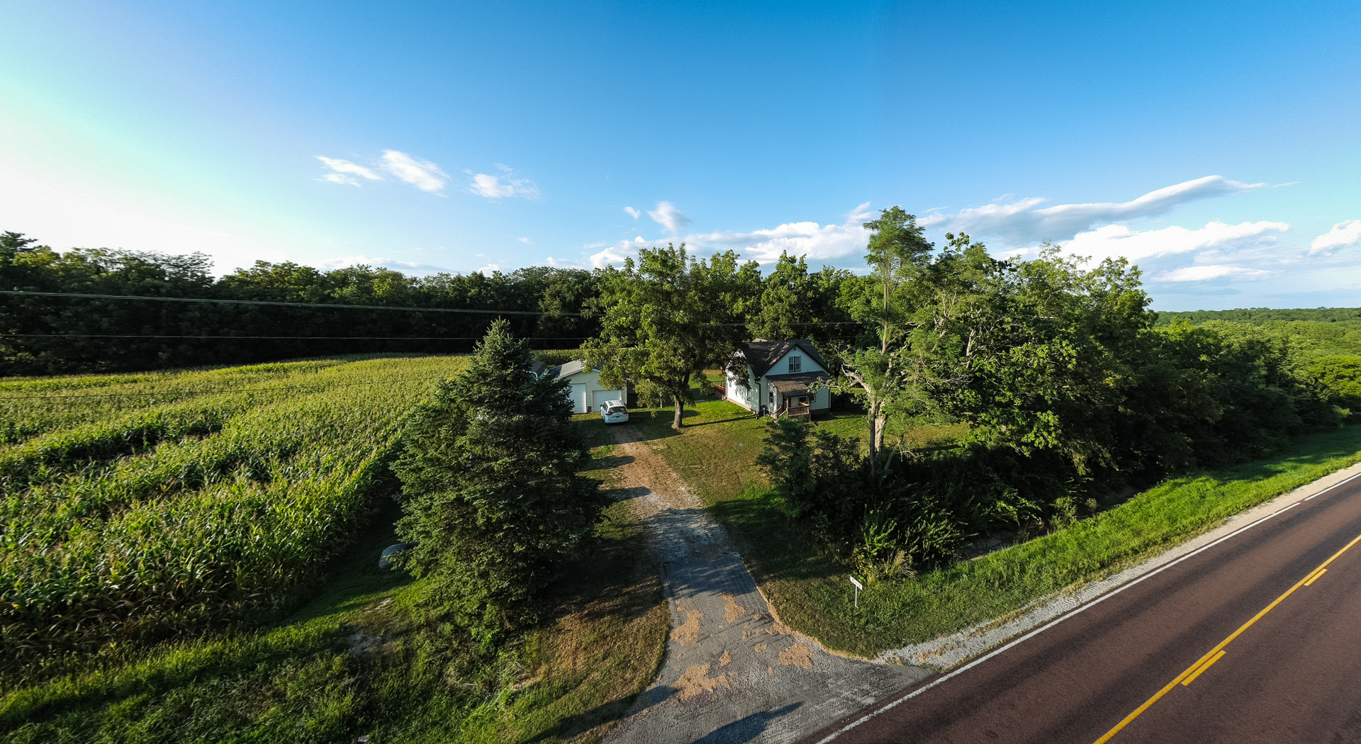 16701 Parnell Road Dewitt, IL 61735 - Photo 3 of 89 a view of a lake from a balcony