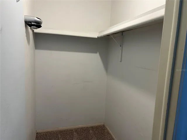 a view of a storage & utility room with washer and dryer