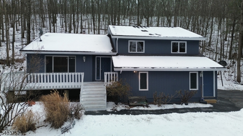118 Statesville Quarry Road Lafayette, NJ 07848 - Photo 2 of 19 a view of a house with a sink and wooden fence