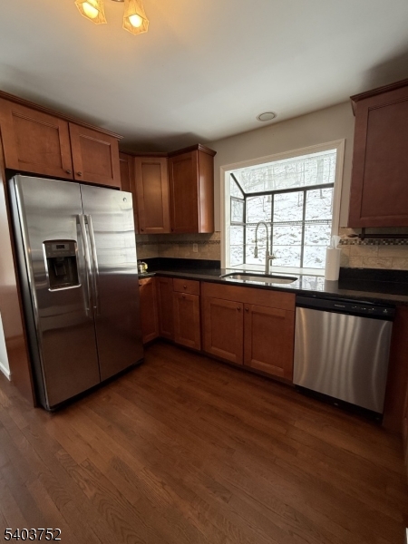 118 Statesville Quarry Road Lafayette, NJ 07848 - Photo 7 of 19 a kitchen with granite countertop stainless steel appliances cabinets a sink and a window