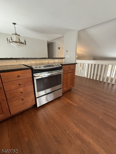 118 Statesville Quarry Road Lafayette, NJ 07848 - Photo 9 of 19 a kitchen with granite countertop a stove and a microwave oven