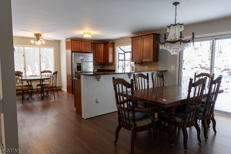 118 Statesville Quarry Road Lafayette, NJ 07848 - Photo 10 of 19 a view of a dining room with furniture window and outside view
