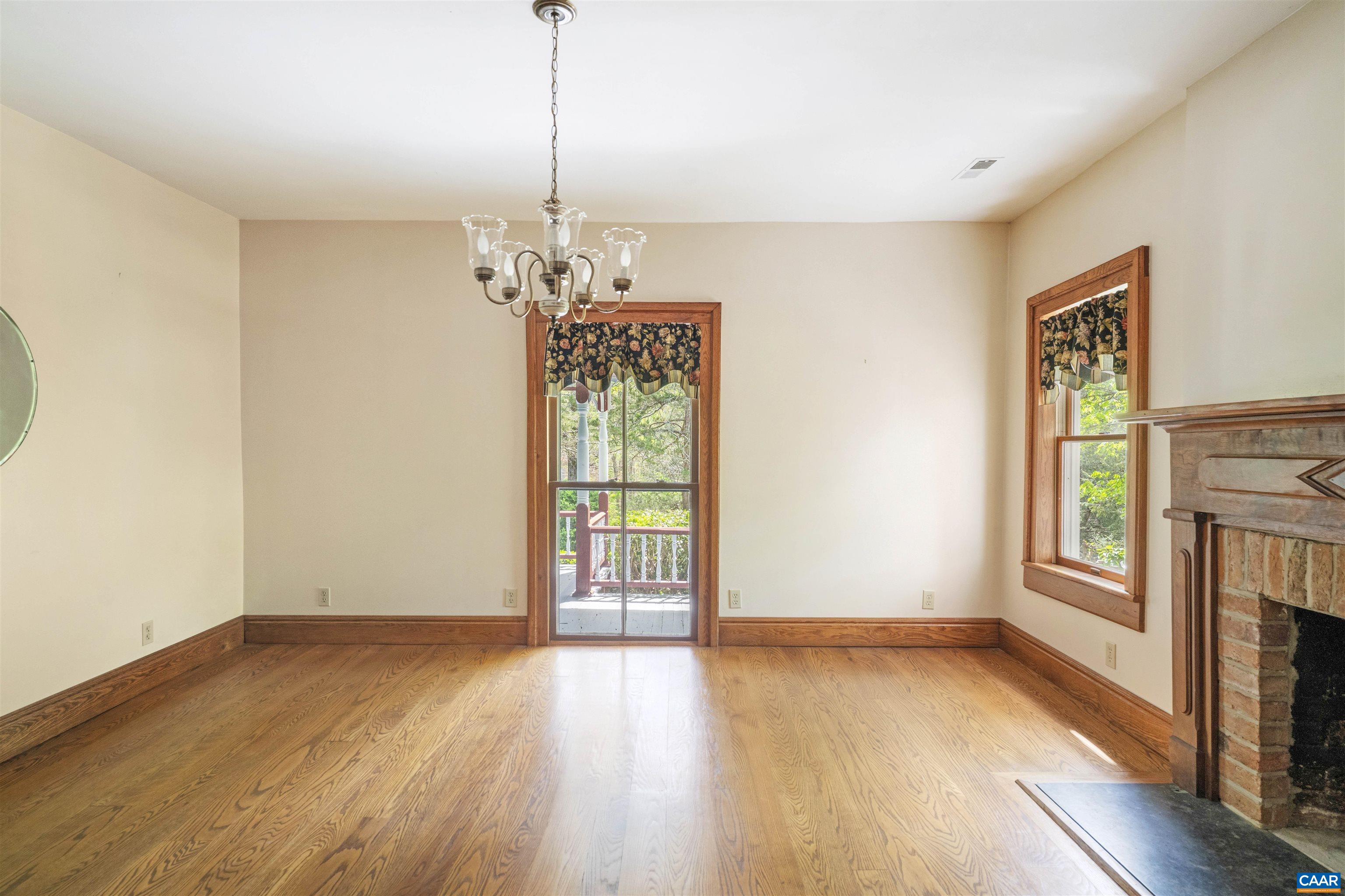 1888 Craigs Store Road Afton, VA 22920 - Photo 16 of 73 a view of an empty room with a window and wooden floor
