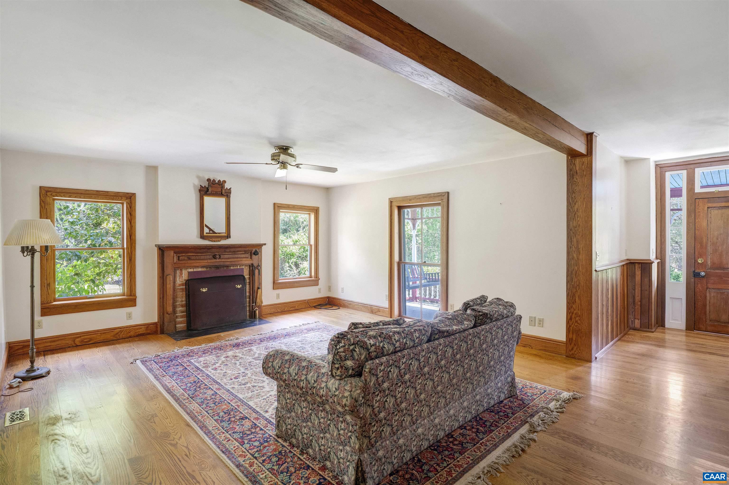 1888 Craigs Store Road Afton, VA 22920 - Photo 4 of 73 a living room with furniture and a fireplace