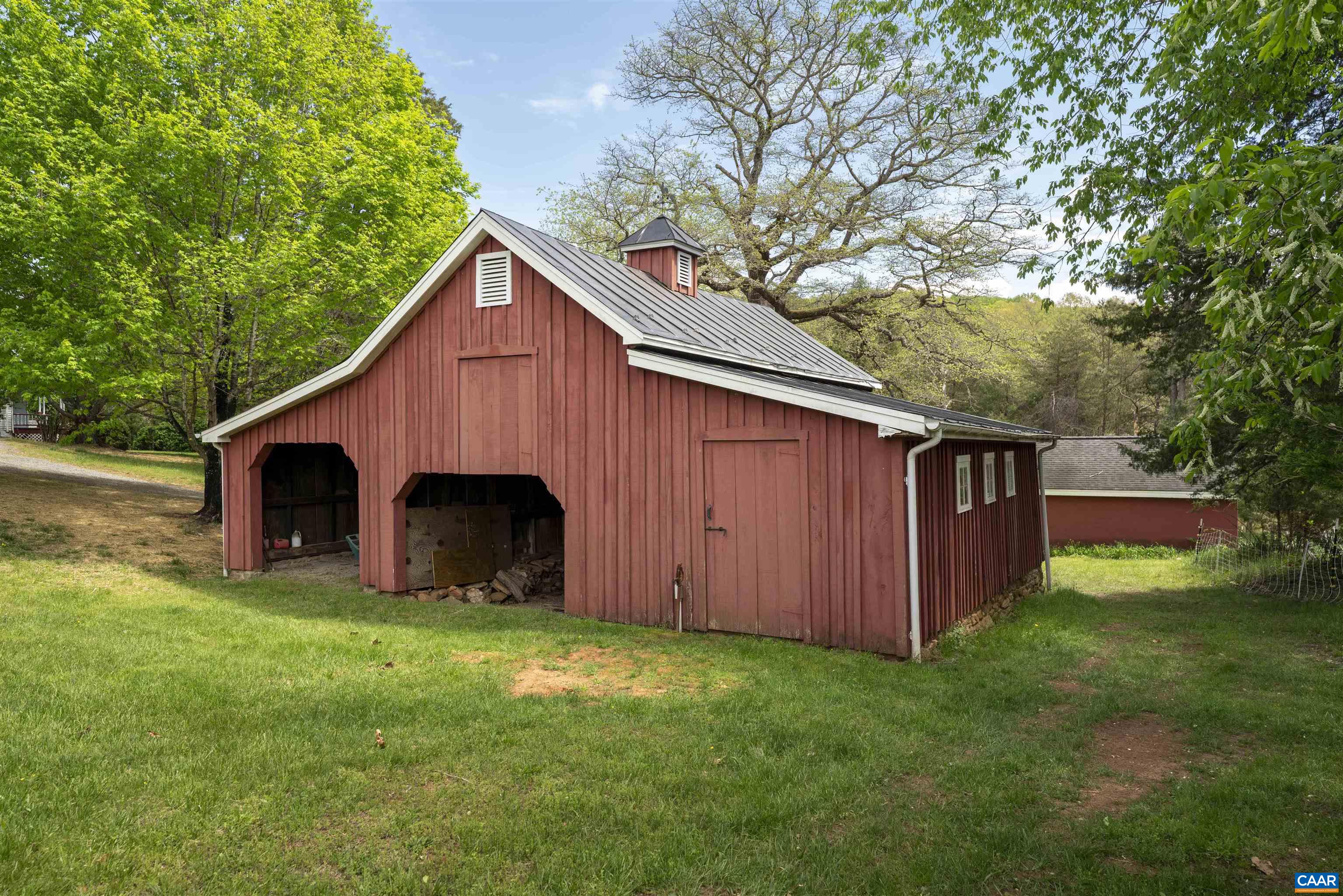 1888 Craigs Store Road Afton, VA 22920 - Photo 58 of 73 a view of a small barn with a big yard and large trees