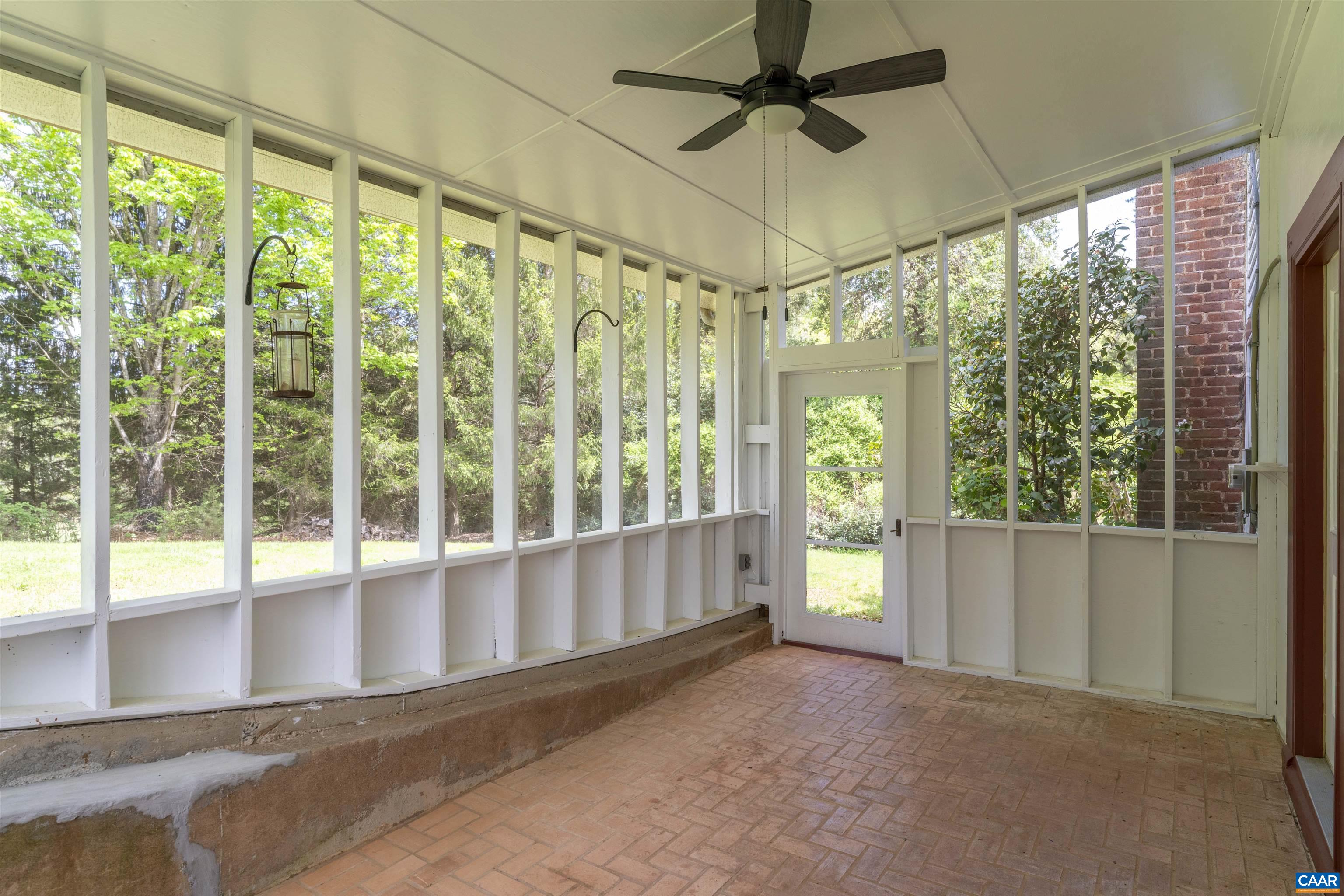 1888 Craigs Store Road Afton, VA 22920 - Photo 62 of 73 a view of an empty room with wooden floor and a window