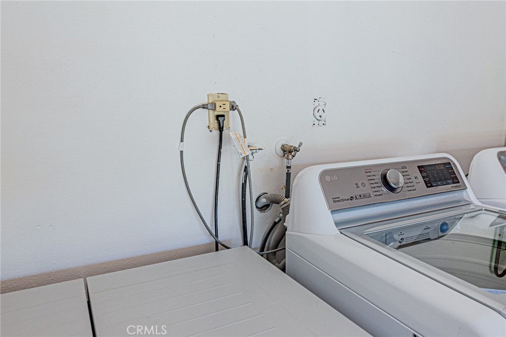 25533 Longfellow Place Stevenson Ranch, CA 91381 - Photo 35 of 47 a view of a room with rack on the wall