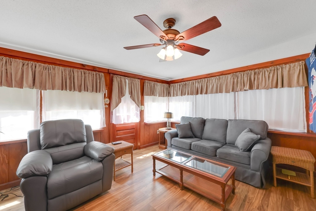 76 Regal Street Springfield, MA 01118 - Photo 14 of 38 a living room with furniture and a large window