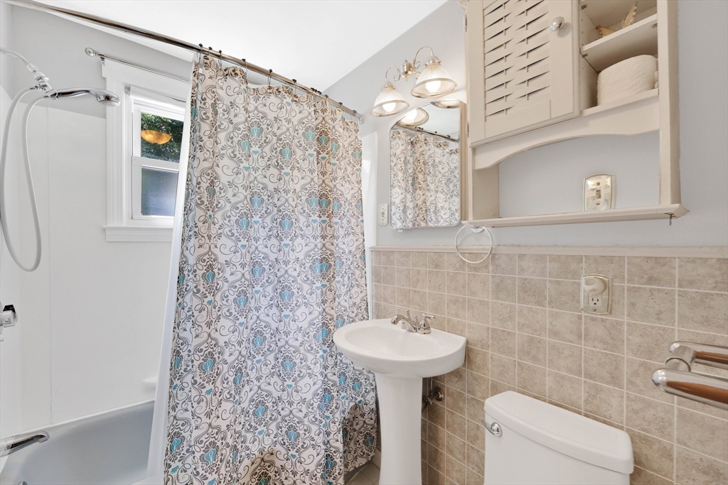76 Regal Street Springfield, MA 01118 - Photo 18 of 38 a bathroom with a sink toilet and shower