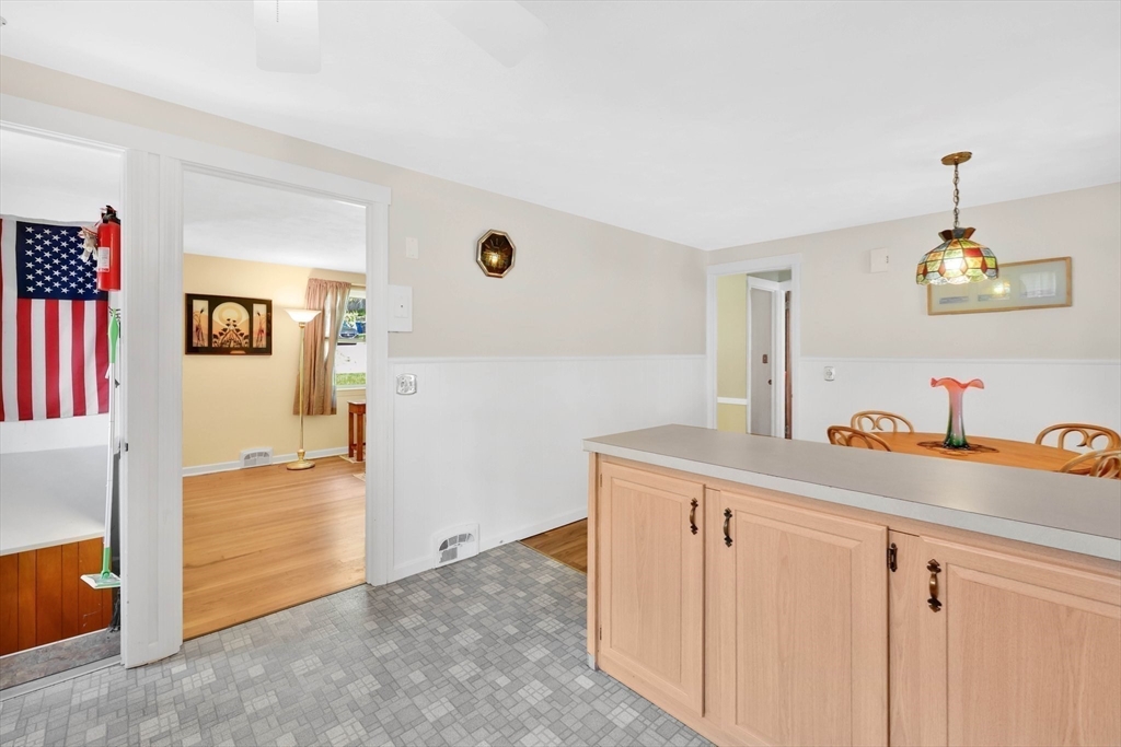 76 Regal Street Springfield, MA 01118 - Photo 9 of 38 a kitchen with a sink and cabinets