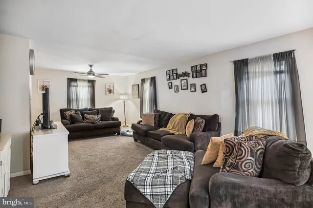 a living room with furniture and a couch