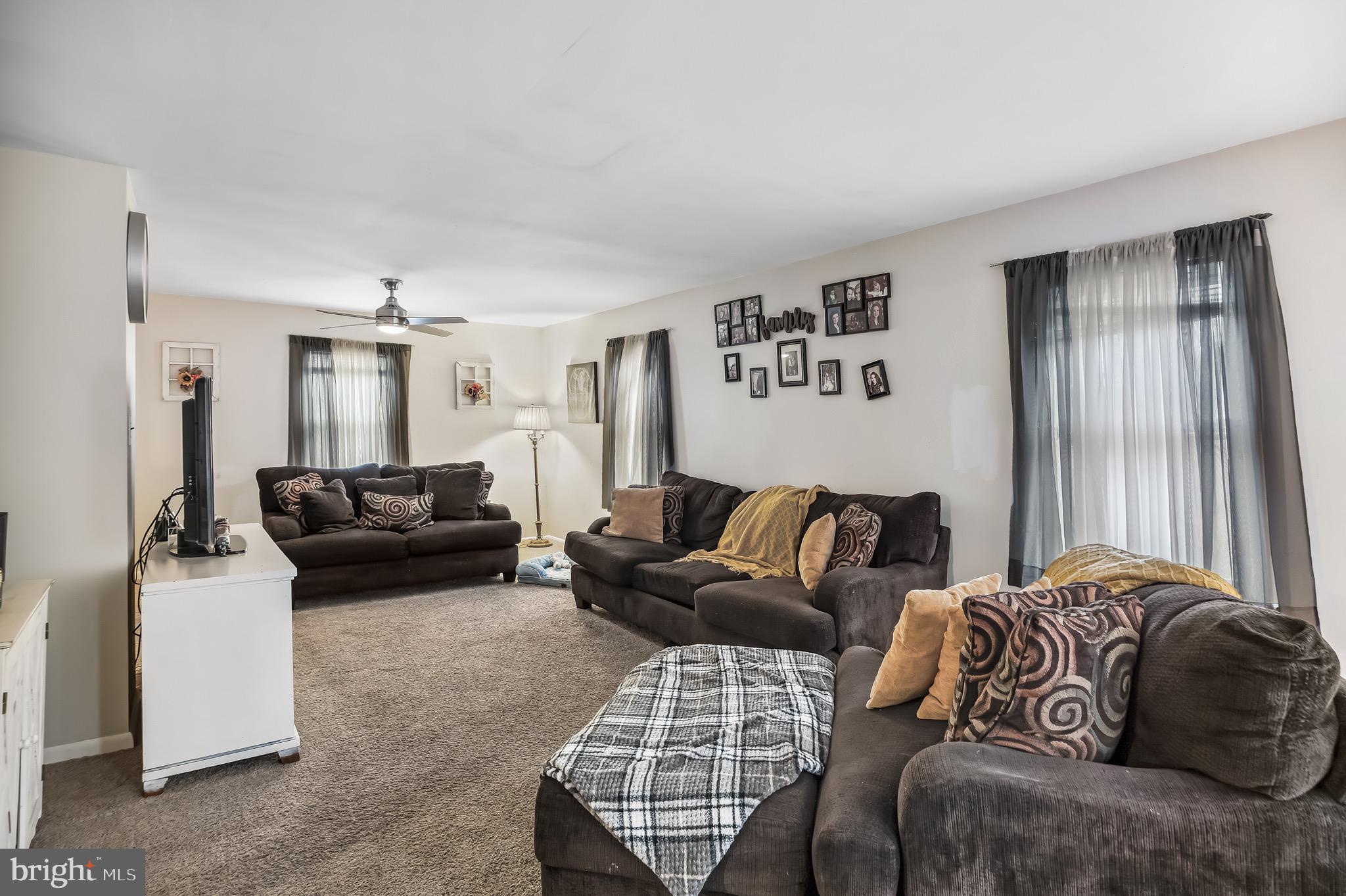 2276 Winslow Road Williamstown, NJ 08094 - Photo 2 of 39 a living room with furniture and a couch