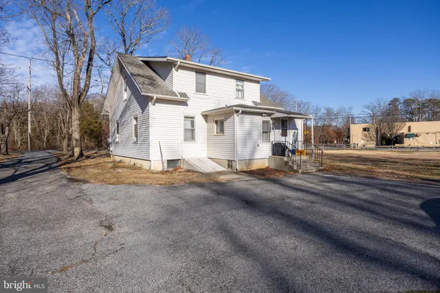 a view of street with parked cars