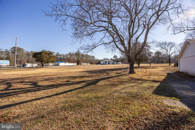 a view of a garage with parked cars