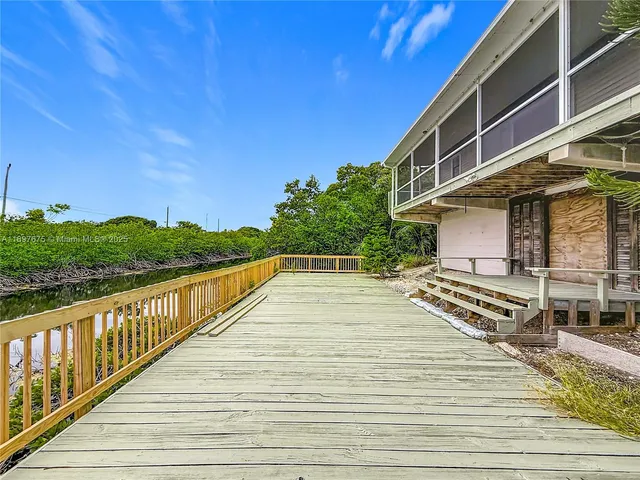 a view of a house with a ocean view