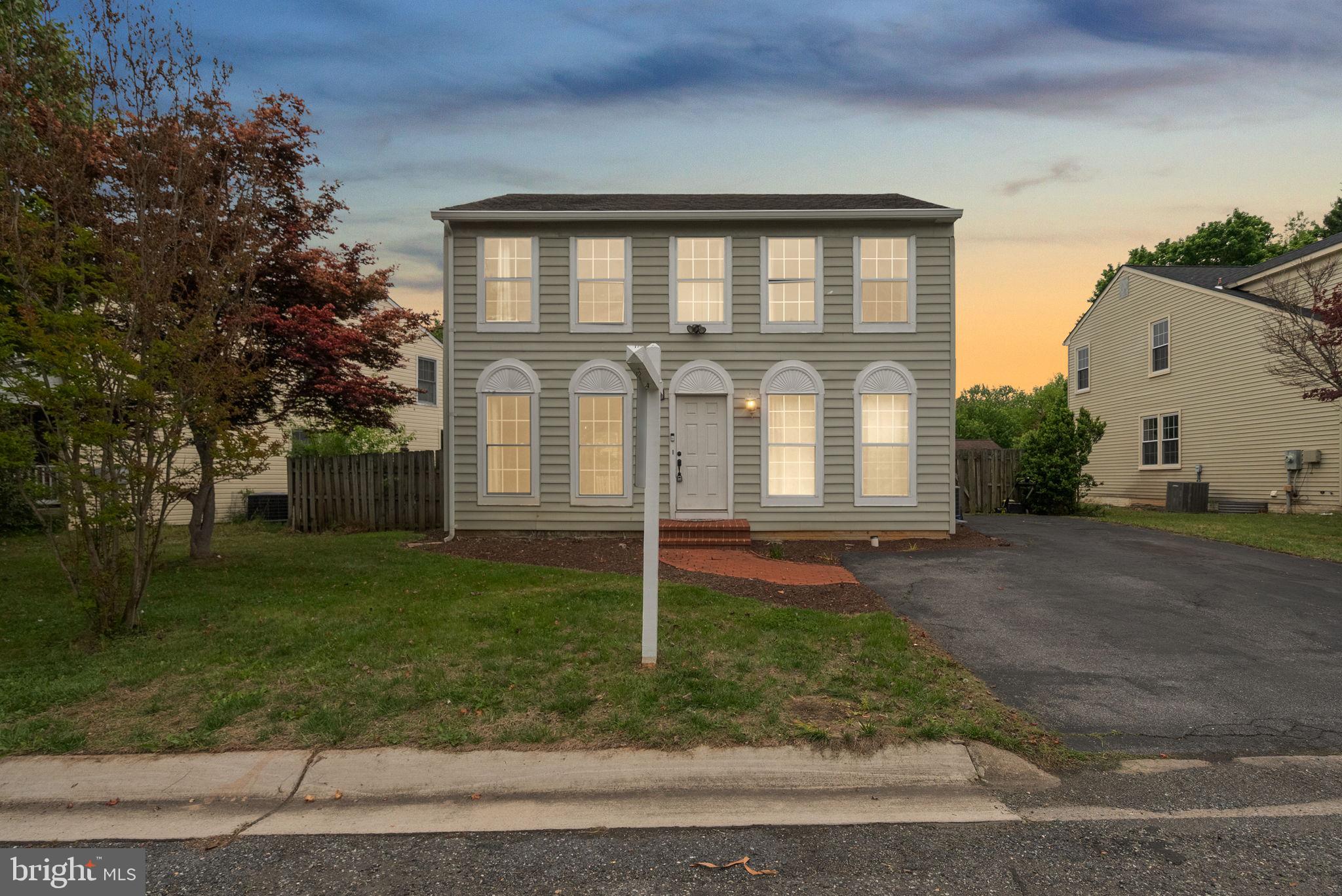 11604 Ranch Lane North Potomac, MD 20878 - Photo 1 of 17 front view of a house with a yard