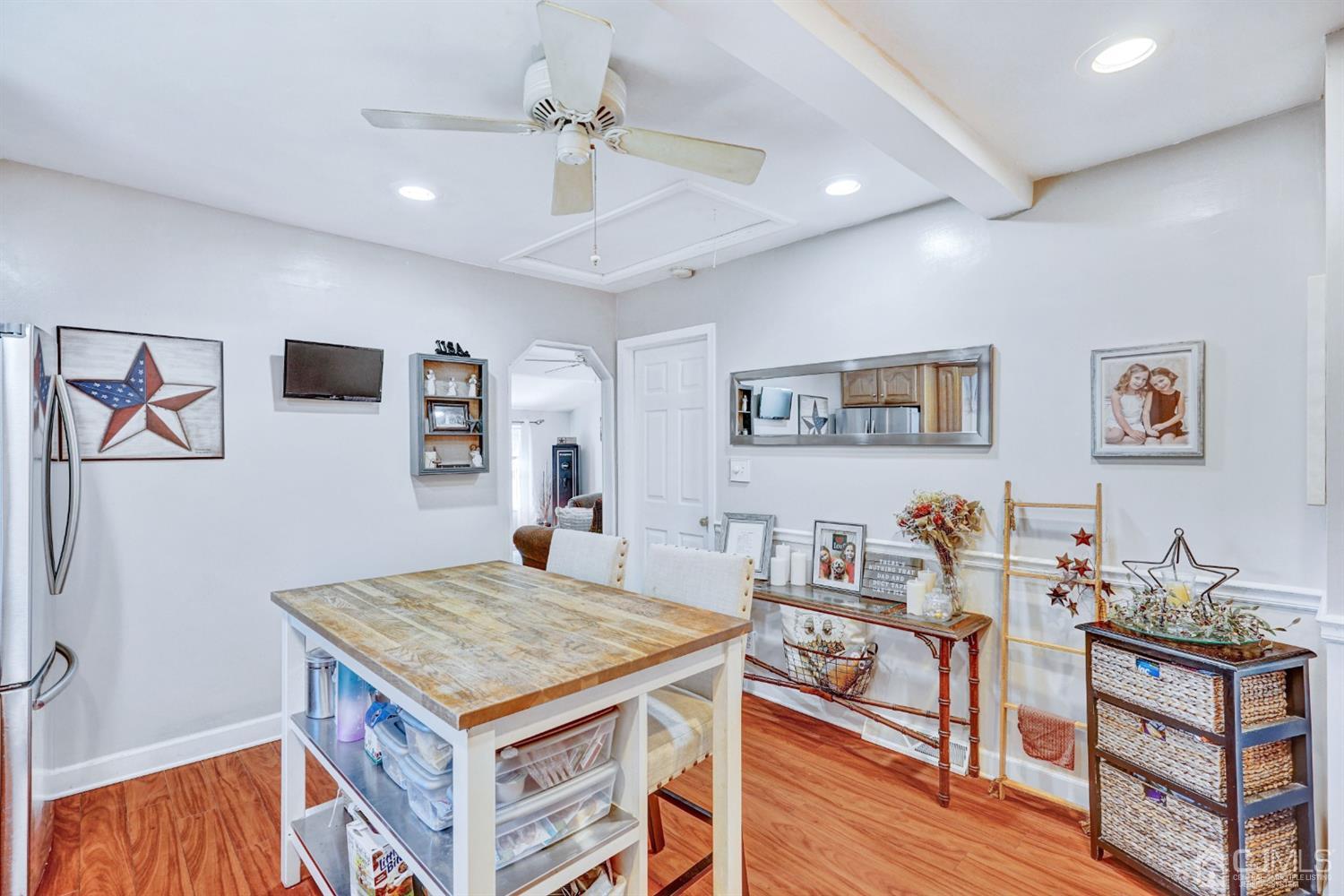 254 Manalapan Road Spotswood, NJ 08884 - Photo 13 of 41 a living room with stainless steel appliances granite countertop furniture and a table