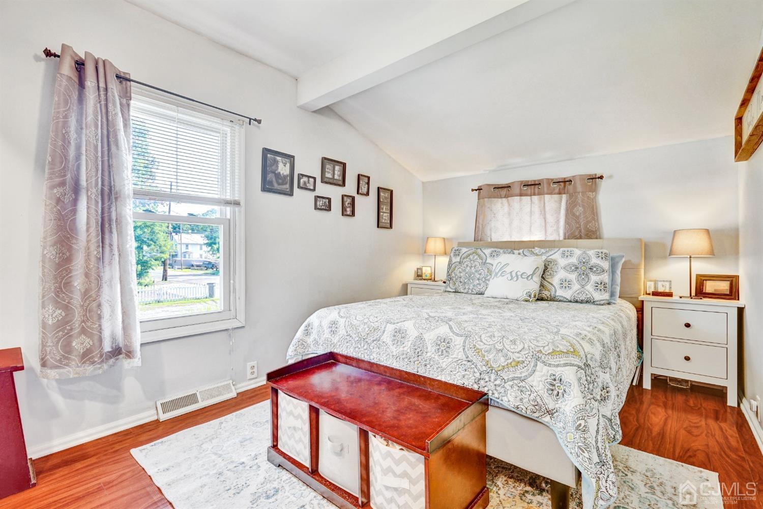 254 Manalapan Road Spotswood, NJ 08884 - Photo 15 of 41 a bed room with a bed and a window