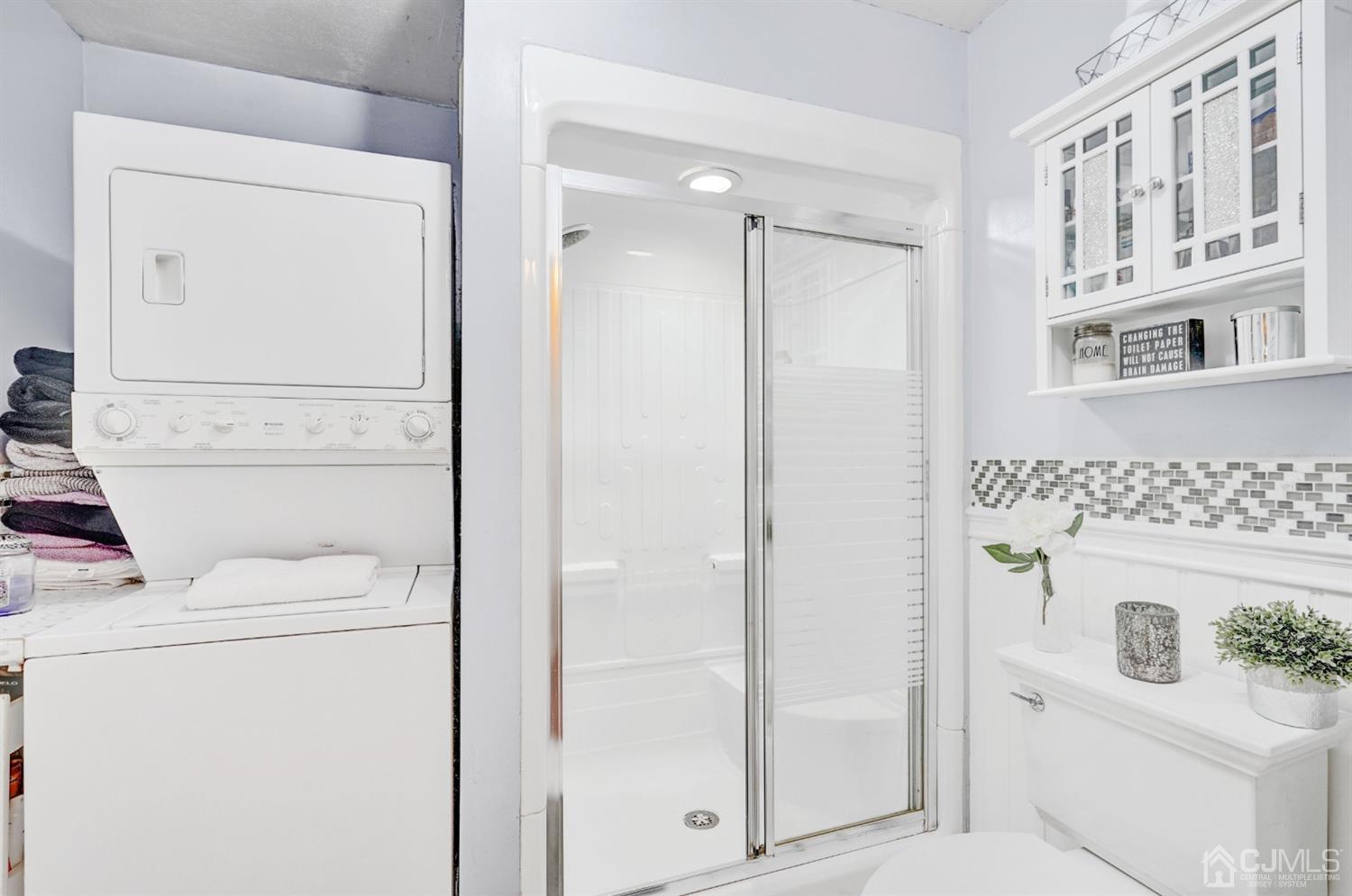 254 Manalapan Road Spotswood, NJ 08884 - Photo 17 of 41 a bathroom with a sink a toilet and shower