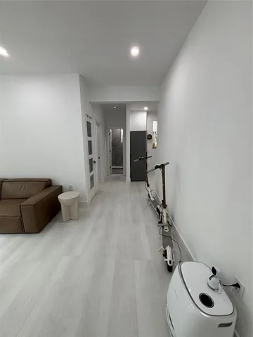 a bed room with a bed and a window