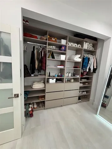 a bathroom with a toilet and a sink