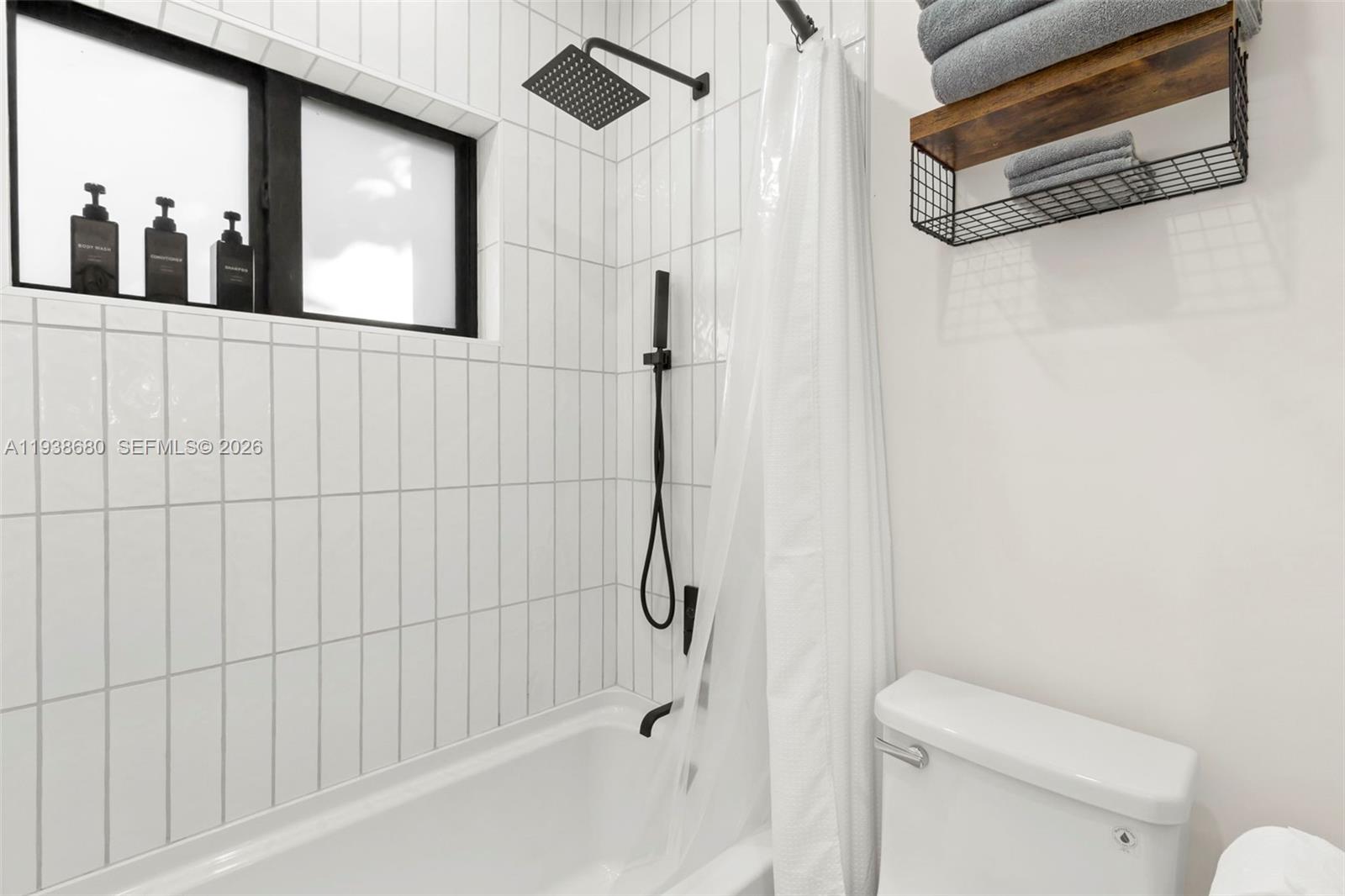 3540 Northeast 28th Avenue Lighthouse Point, FL 33064 - Photo 35 of 47 a bathroom with a shower