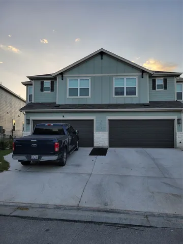 a car parked in front of a house