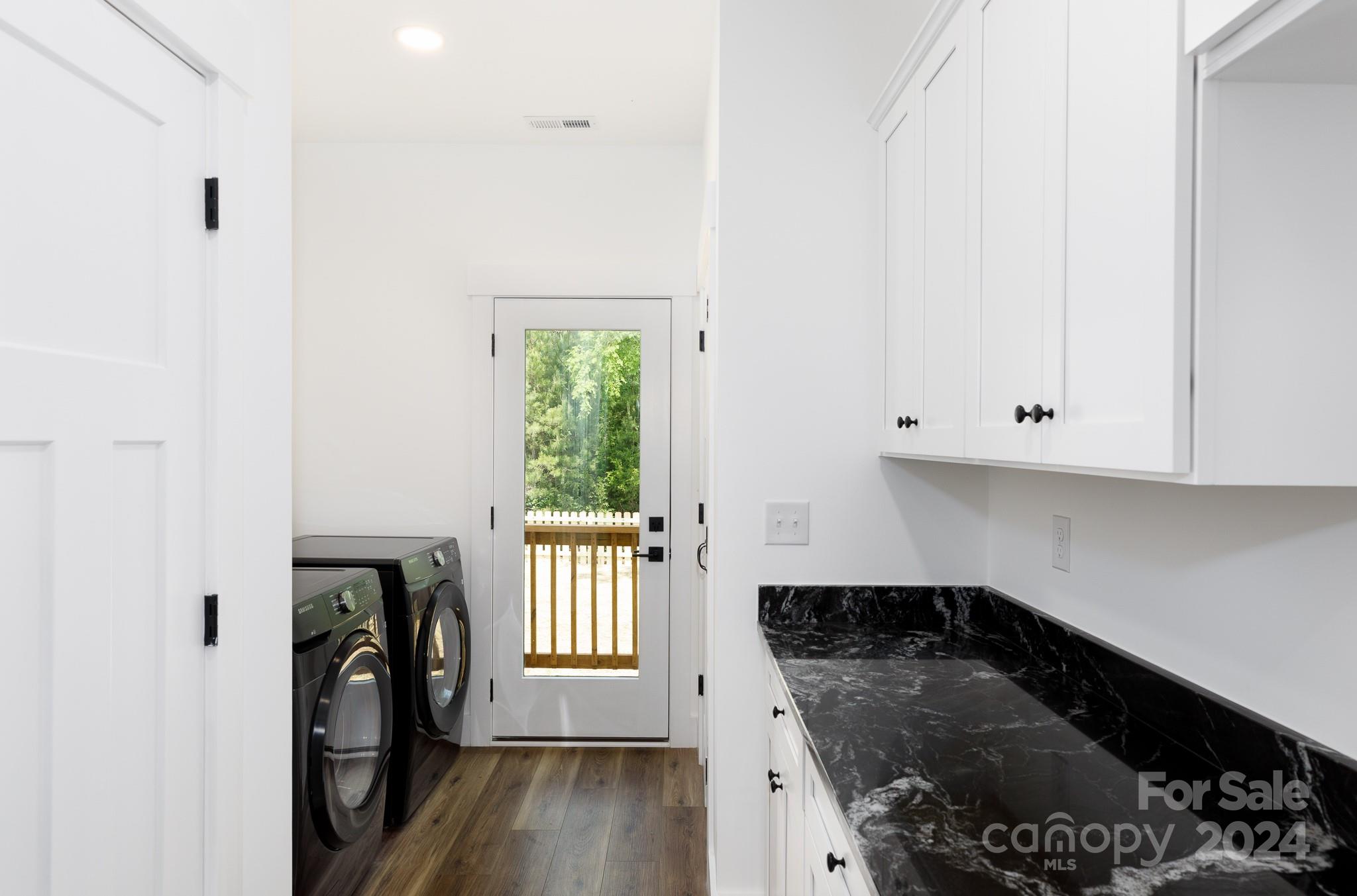 5040 Mt Gallant Road Rock Hill, SC 29732 - Photo 12 of 38 a kitchen with wooden cabinets and a stove
