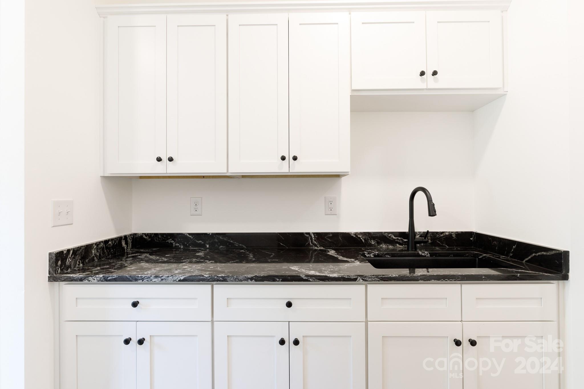 5040 Mt Gallant Road Rock Hill, SC 29732 - Photo 13 of 38 a close view of a stove a microwave and cabinets