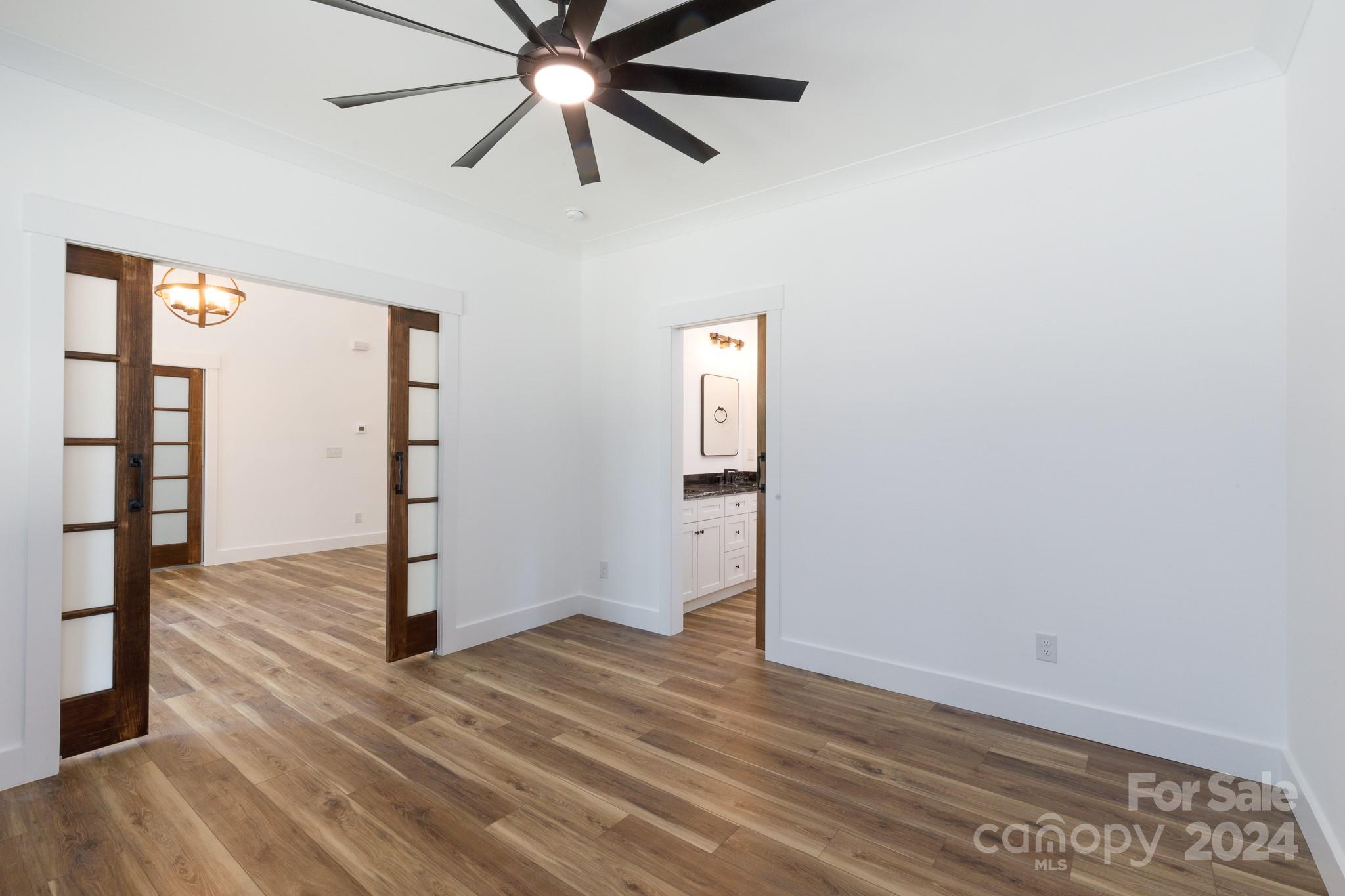5040 Mt Gallant Road Rock Hill, SC 29732 - Photo 18 of 38 an empty room with wooden floor closet and windows