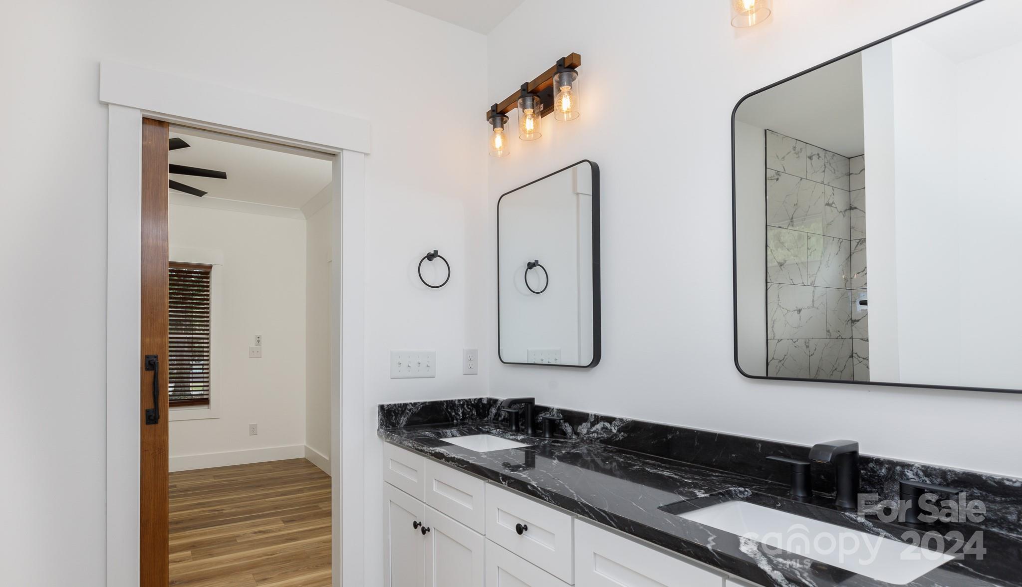5040 Mt Gallant Road Rock Hill, SC 29732 - Photo 20 of 38 a bathroom with a sink and a mirror