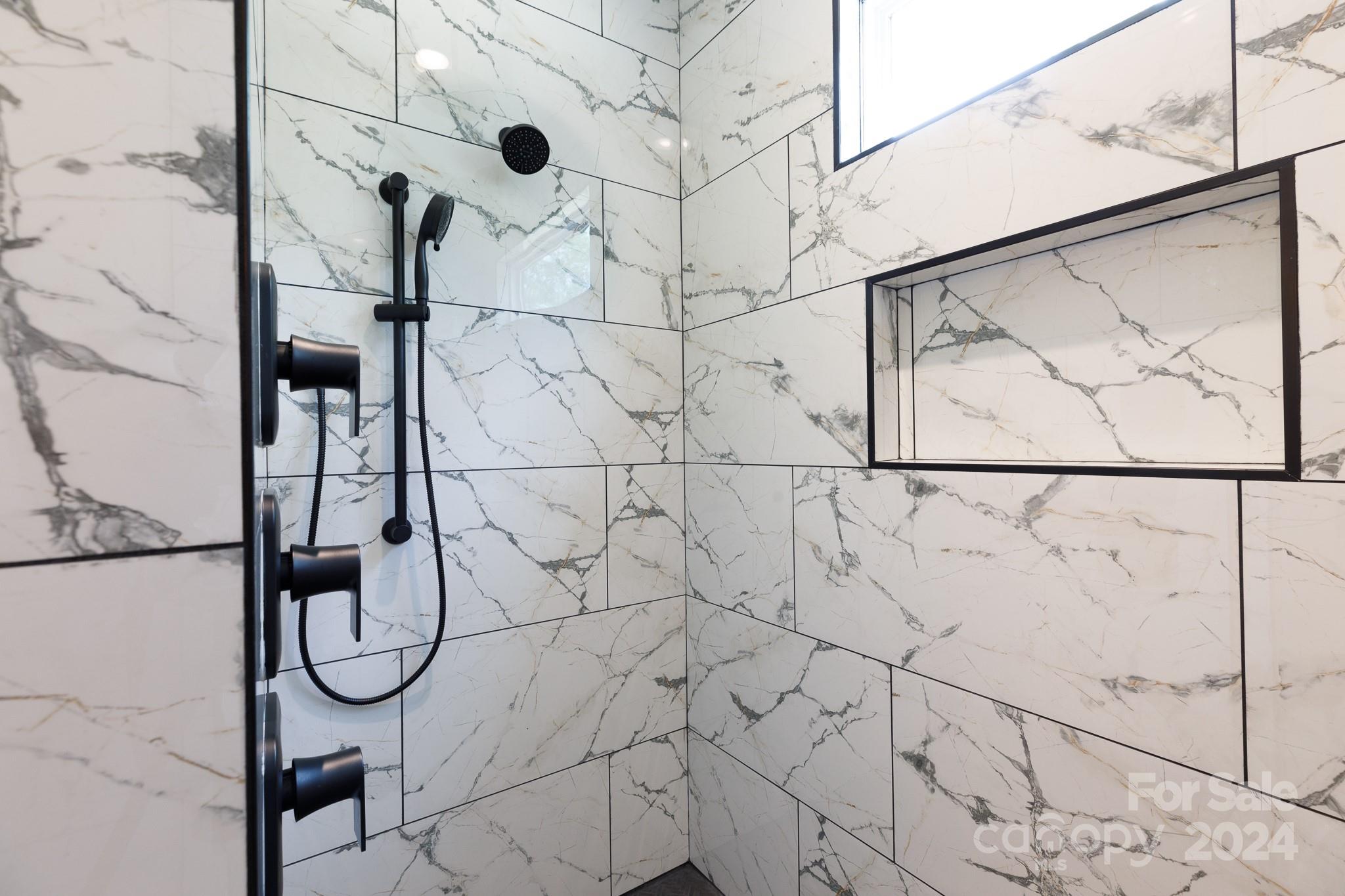 5040 Mt Gallant Road Rock Hill, SC 29732 - Photo 23 of 38 a bathroom with shower and mirror
