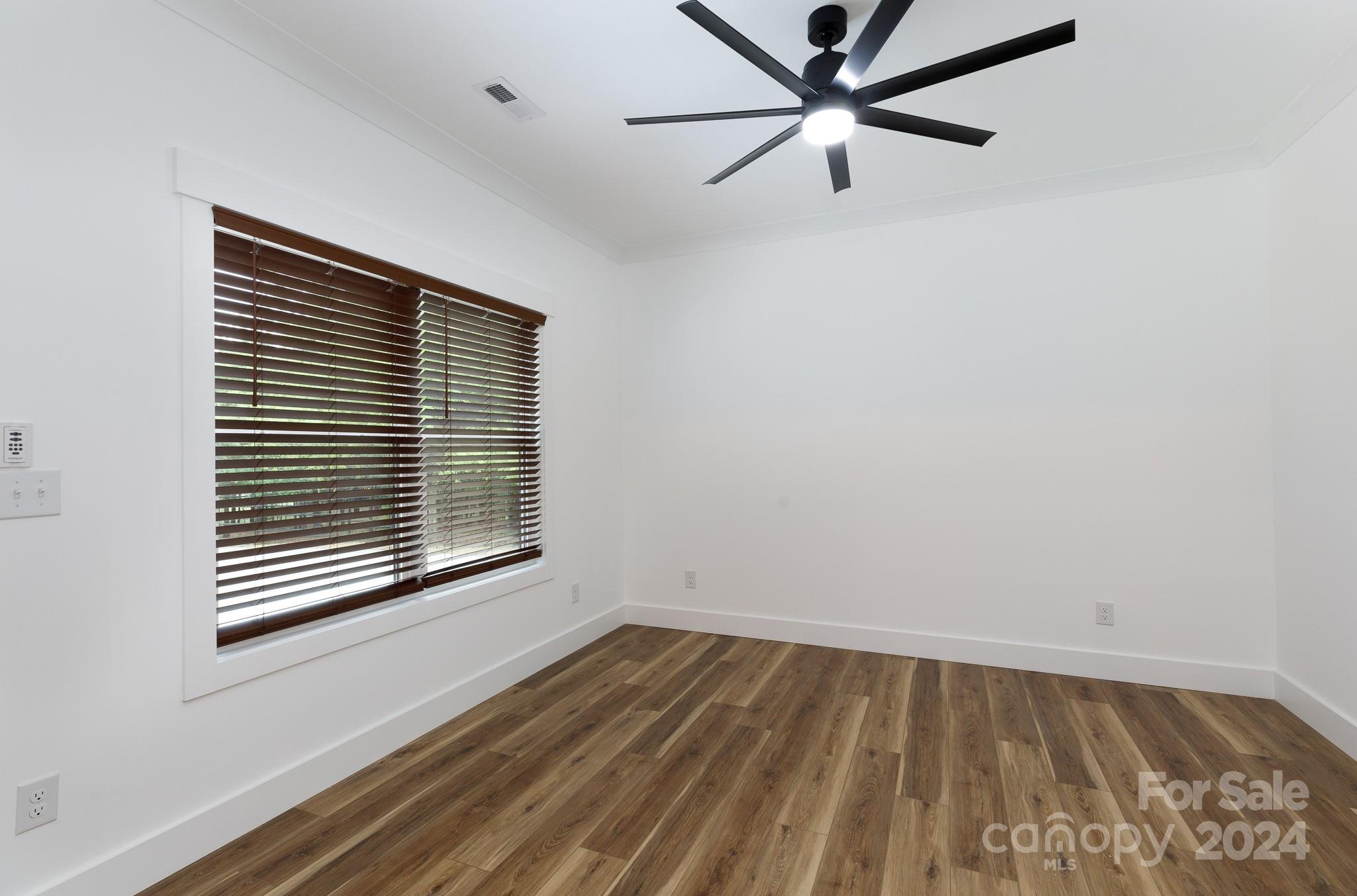 5040 Mt Gallant Road Rock Hill, SC 29732 - Photo 24 of 38 an empty room with a window and a fan