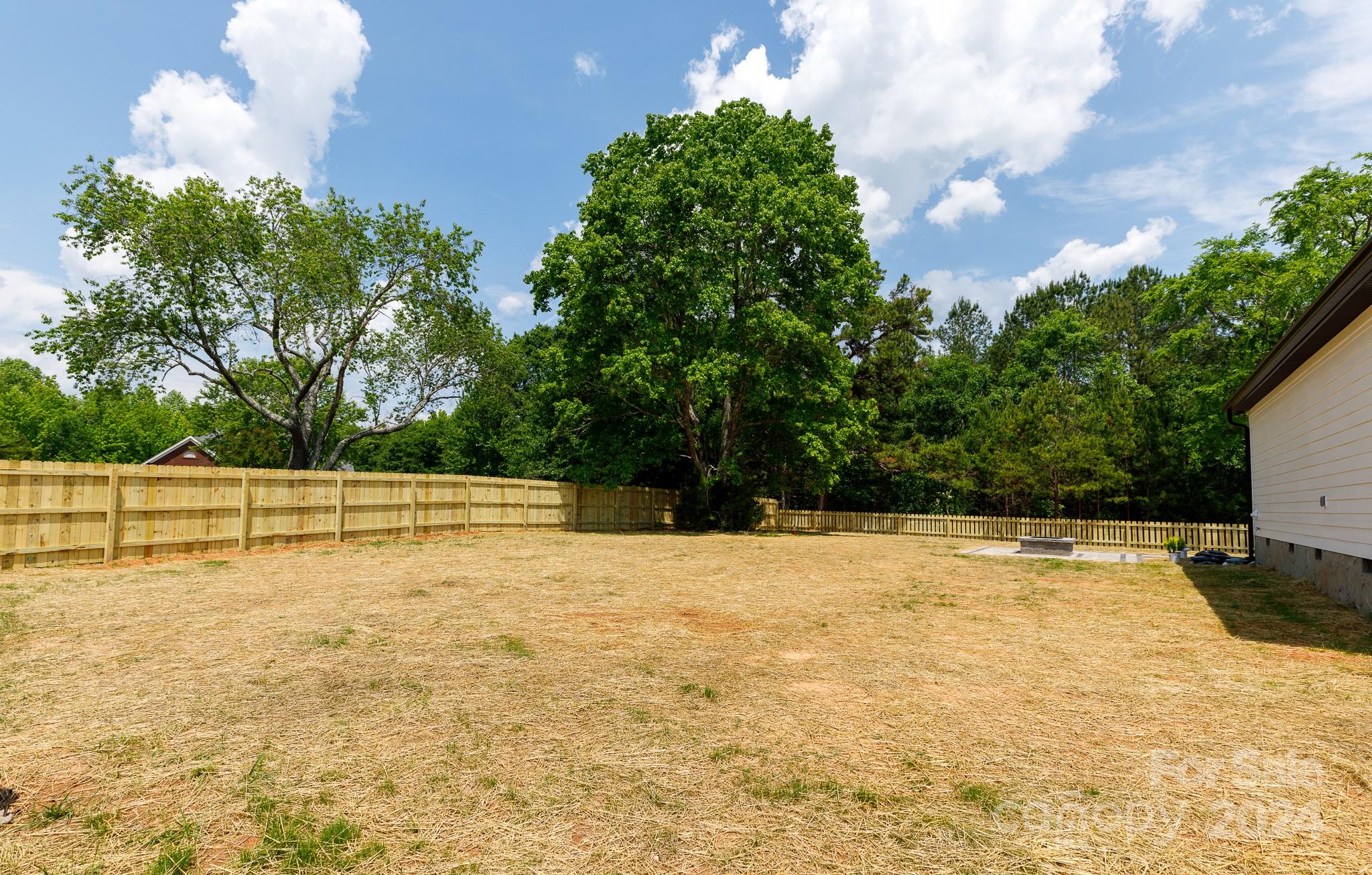 5040 Mt Gallant Road Rock Hill, SC 29732 - Photo 32 of 38 a view of a swimming pool with an outdoor space and seating area
