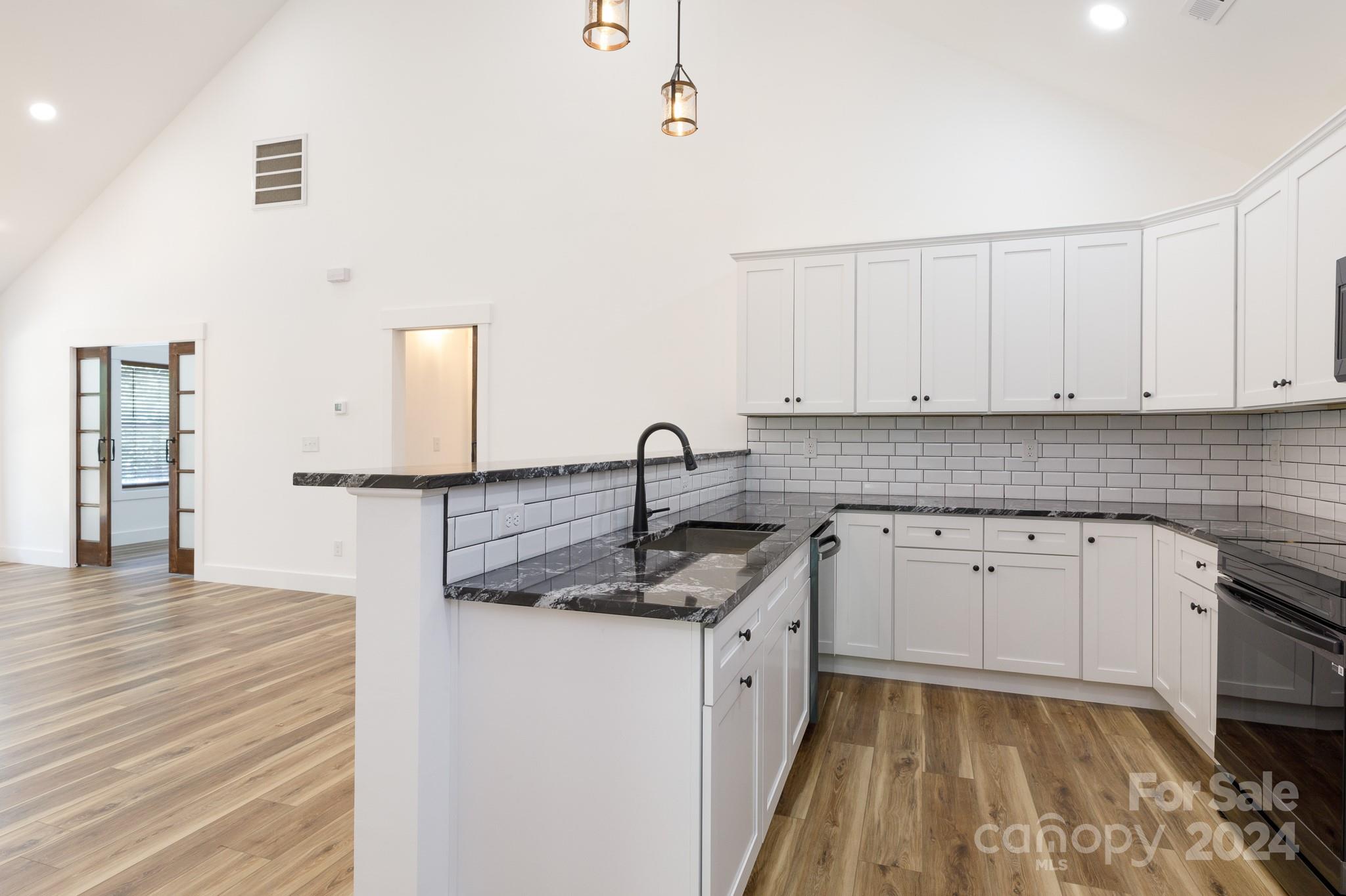 5040 Mt Gallant Road Rock Hill, SC 29732 - Photo 10 of 38 a kitchen with a sink and cabinets